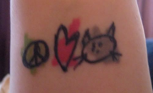 source Peace Love Kitty tattoo on Flickr uniquewristtattoo