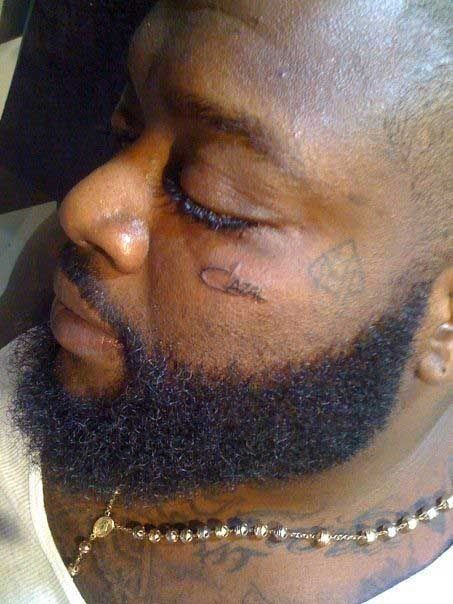 pics of rick ross tattoos. Another day another facial tattoo. Rick Ross is the newest addition to the