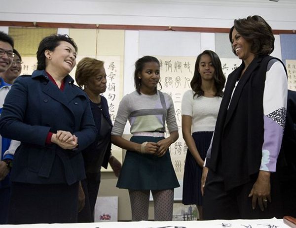 SAY CHEESE! FLOTUS, Sasha & Malia Obama Get FLAWLESS ...