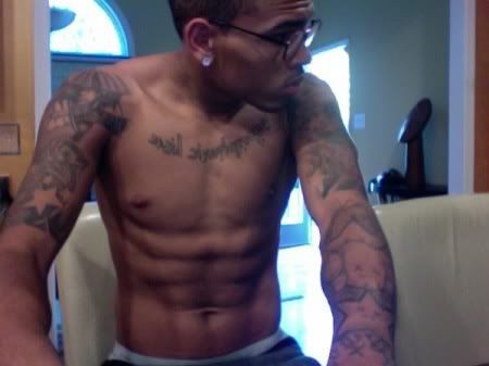 chris browns tattoos. Chris Brown took over 102.3