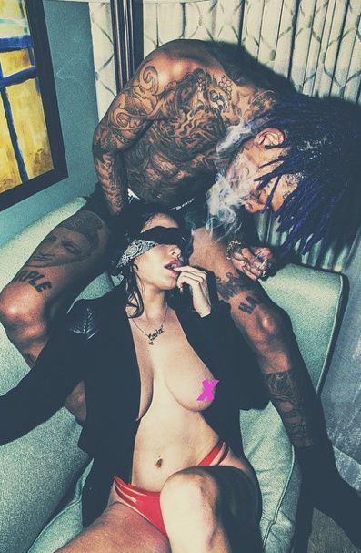 An almost naked Wiz Khalifa posted a few pics of himself getting down and d...
